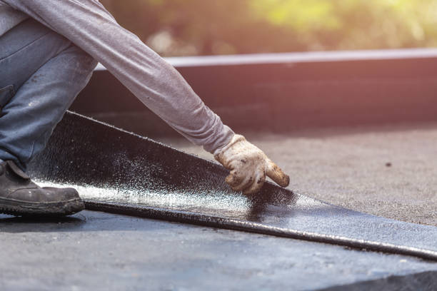 Professional Basement Waterproofing technician working in Tallassee, AL